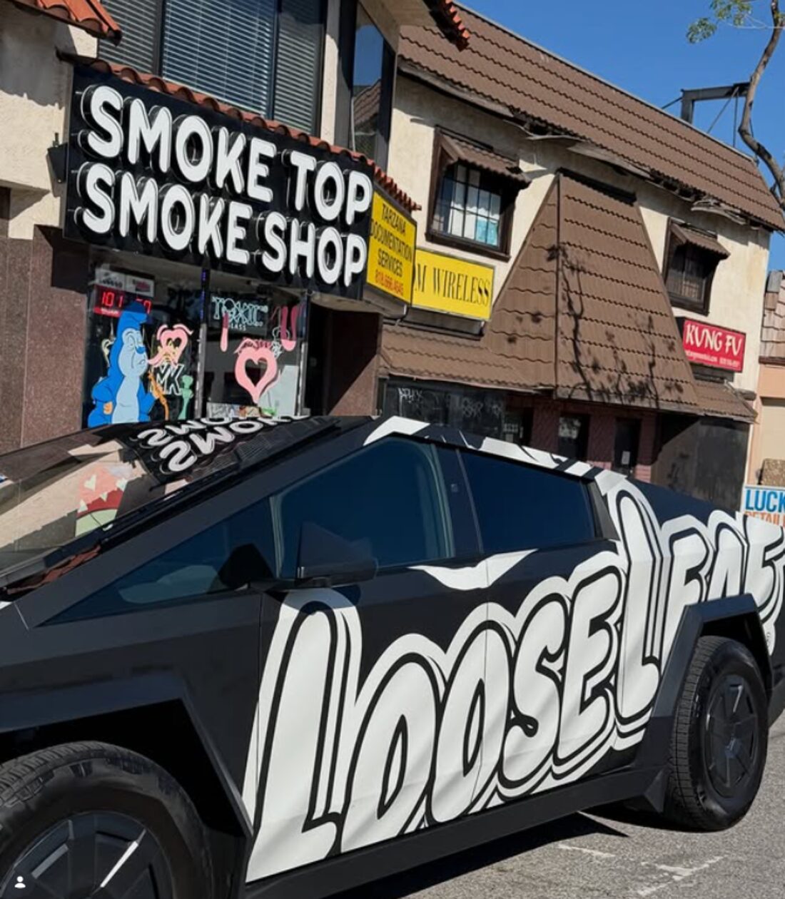 The Smoke Top storefront on Ventura Boulevard in Tarzana with its illuminated signage